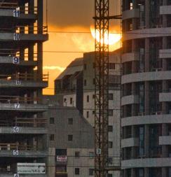 Sunset and two traffic lights